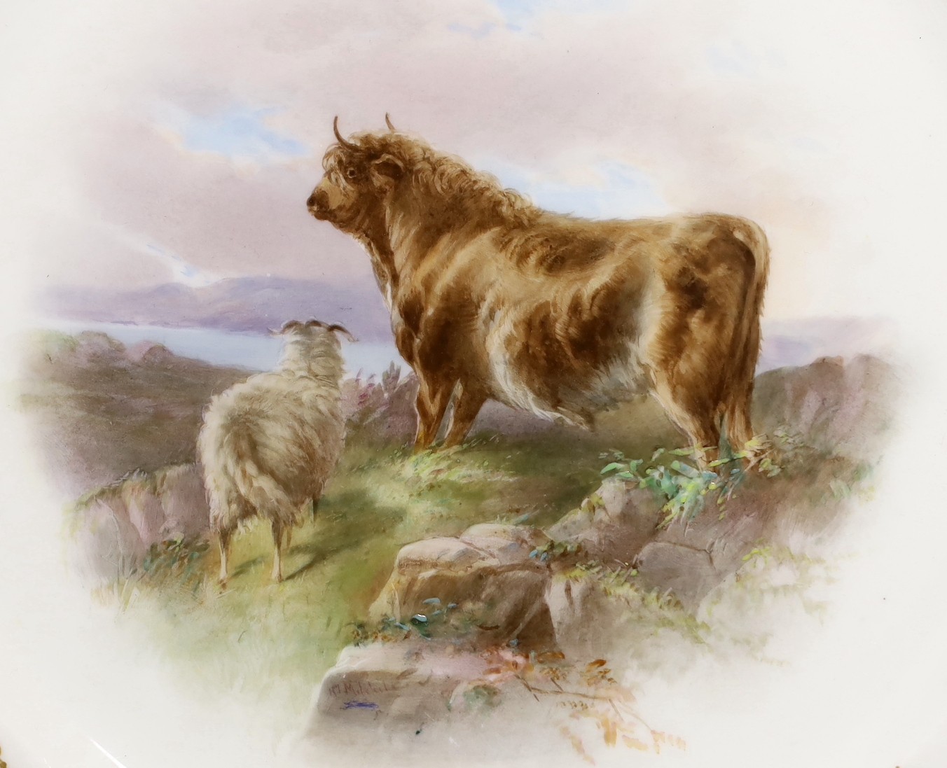 A Minton plate with turquoise, acid etched and raised gilt border painted with a bull and a sheep by Henry Mitchell, signed Henry Mitchell on the rock in the foreground, 24cm